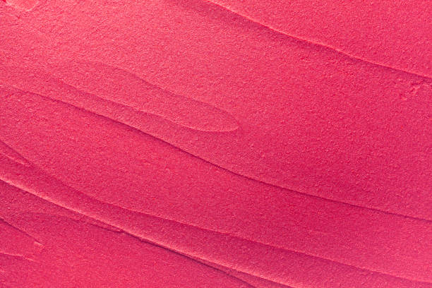macchiato vibrante rosso arancione corallo viola rosa scarlatto marrone marrone tinta testurina o rossetto sfondo multicolore - rossetto foto e immagini stock