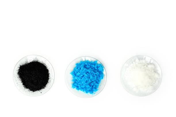 istock Cosmetic chemicals ingredient on laboratory table. Copper(II) sulfate, Potassium chloride, Potassium permanganate. (Top View) 1263556637