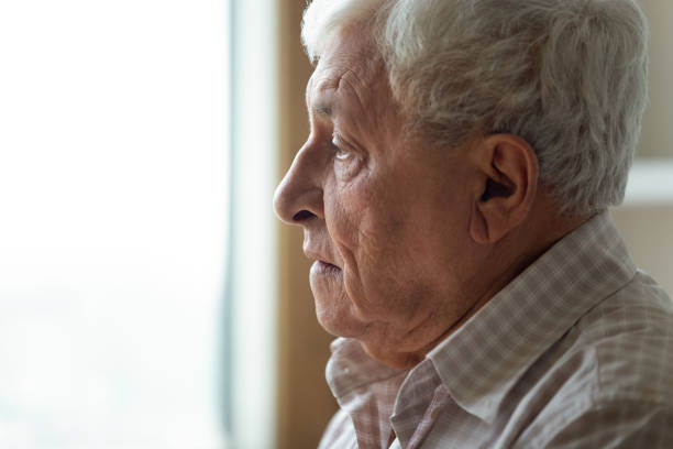 istock Sad senior man look in distance feeling lonely 1263560210