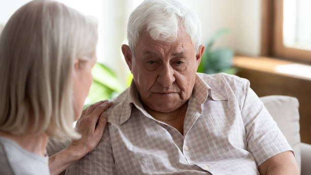 istock Caring mature woman comfort support upset elderly man 1263560213