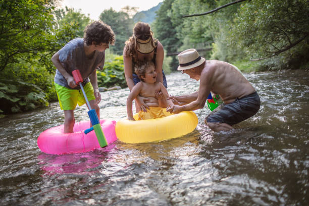 istock Family summer fun on a river 1263561924