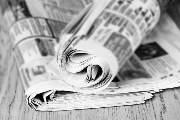 istock Newspapers on the desktop. Daily news concept. Selective focus. 1263562408