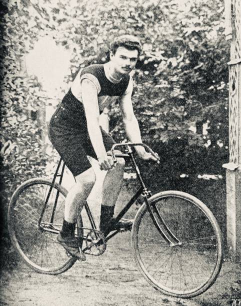 istock Cyclist H. Kirkaldie, Moskau, sitting on his bicycle in a garden 1263563154
