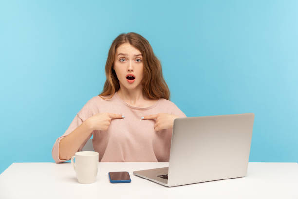 istock This is me! Amazed woman pointing herself and looking at camera with surprised expression, shocked by achievement 1263563577