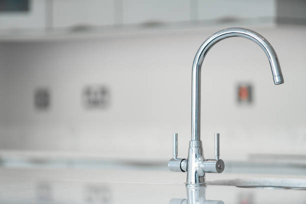 istock Modern tap and sink in a kitchen 1263565059