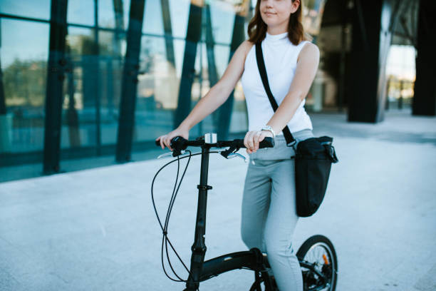 istock Businesswoman going to office by bicycle 1263566961