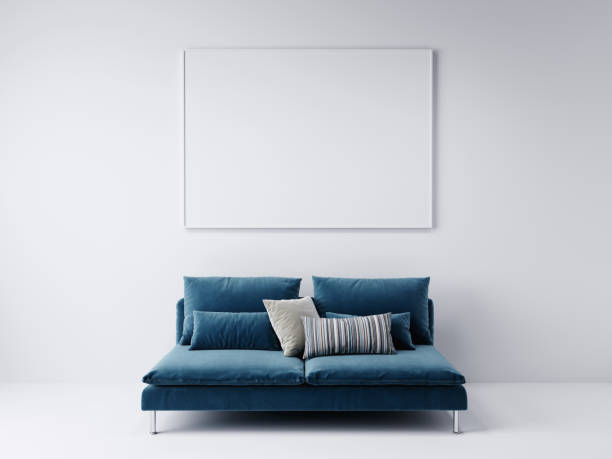 istock blue sofa in front of the horizontal empty mockup picture frame hanging on the white wall, 3D background concept 1263569557