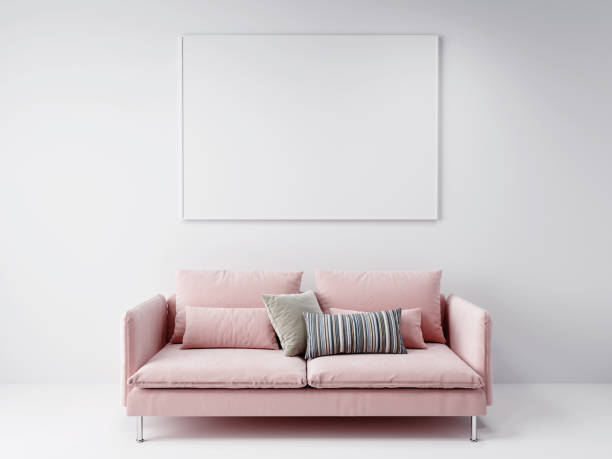istock pink sofa in front of the horizontal empty mockup picture frame hanging on the white wall, 3D background concept 1263569578