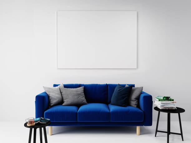 istock blue sofa in front of the horizontal empty mockup picture frame hanging on the white wall, 3D background concept 1263569601