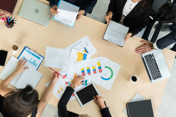 istock Business people group meeting shot from top view 1263569816