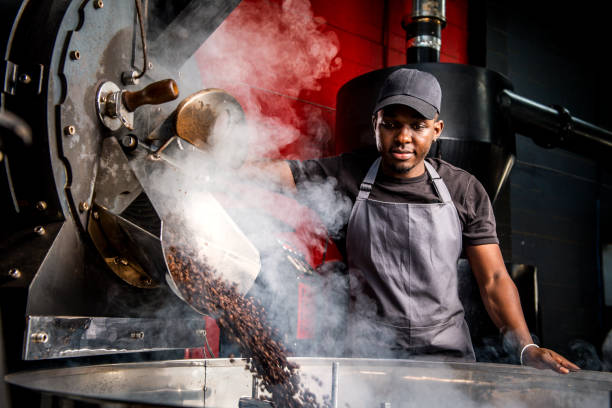 Barista in smokey roastery landscape