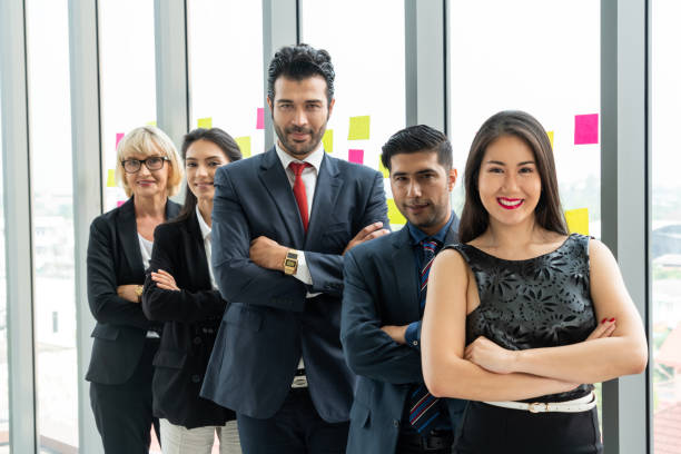 istock Successful business people standing together 1263571510