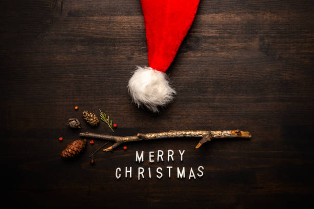 istock Santa Claus hat and Merry Christmas text 1263573426