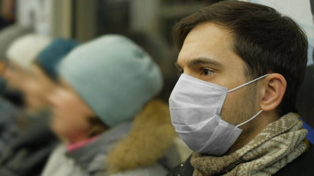 istock Man in Mask Underground. Coronavirus Mers USA. Influenza Precautions. SARS-CoV-2 1263576968