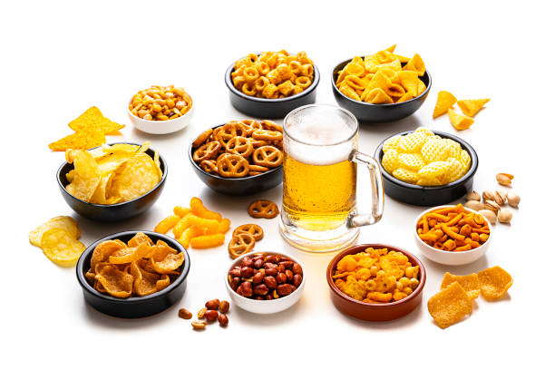 istock Salty snacks and beer isolated on white background 1263577566