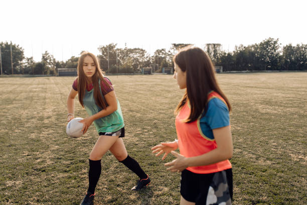 istock Two girls playing rugby 1263579182