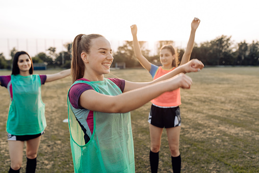 Female rugby team having a training.