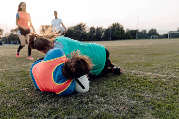 istock Rough training of a female rugby team 1263579200