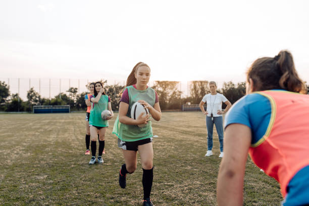 istock Female rugby players training with their coach 1263579210