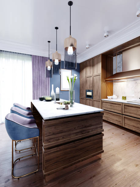 istock Fashionable designer kitchen with an island with a marble working surface, a kitchen in blue and brown colors, wooden furniture. 1263579550