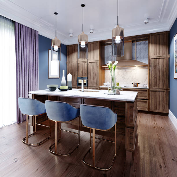 istock Fashionable designer kitchen with an island with a marble working surface, a kitchen in blue and brown colors, wooden furniture. 1263586873
