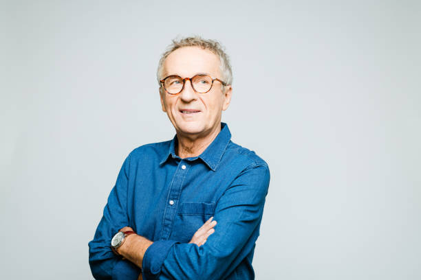istock Portrait of smiling senior man 1263609218