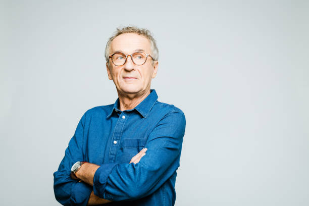 istock Portrait of surprised senior man 1263609643