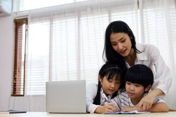 istock Happiness two children learning on smart phone at home in holiday weekend. 1263611747