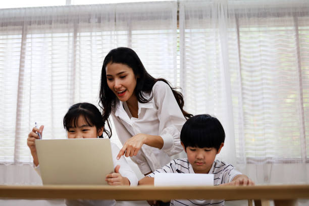 istock Happiness two children learning on smart phone at home in holiday weekend. 1263611778