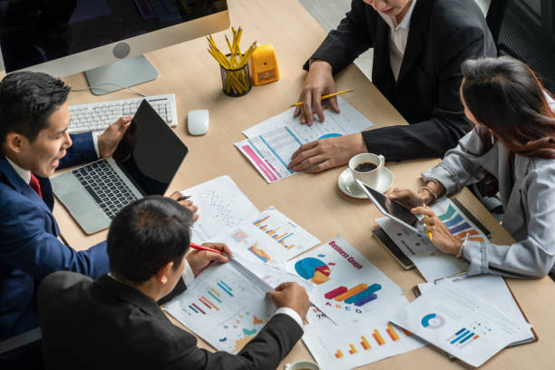 istock Business people group meeting shot from top view 1263614095