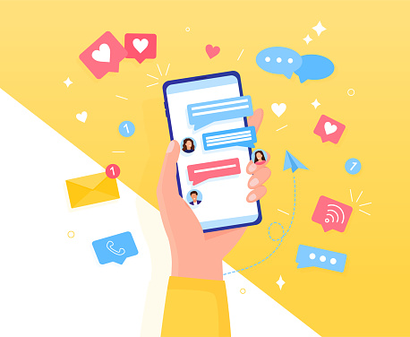 Hand holding phone with short messages, icons and emoticons. Chatting with friends and sending new messages. Colorful speech bubbles boxes on smartphone screen flat design vector illustration.