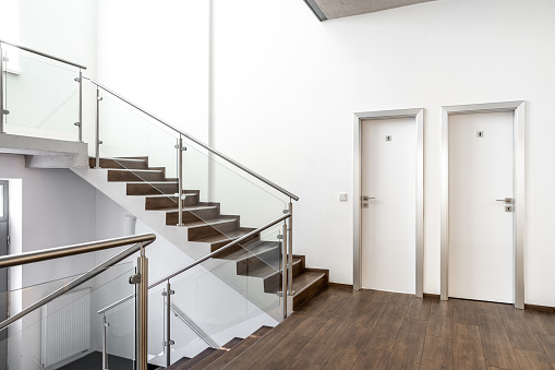 staircase in a modern building, toilet door.