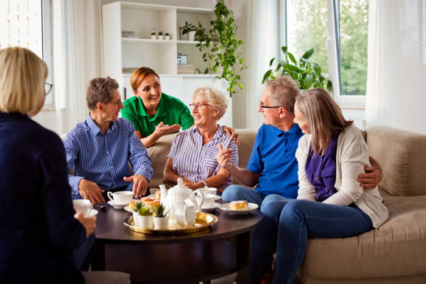 istock Cheerful senior people in retirement house 1263618617