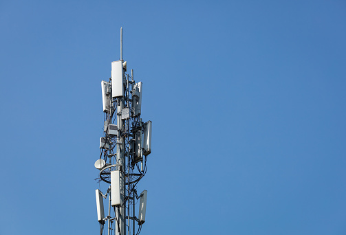 communication tower for 5G network telephone cellsite with dusk sky