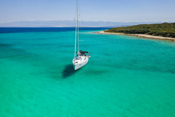 istock Anchored sailboat, view from drone 1263619006