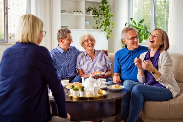 istock Happy senior people in retirement house 1263619408