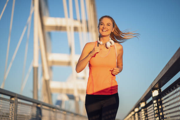 istock Woman jogging outdoor 1263619451