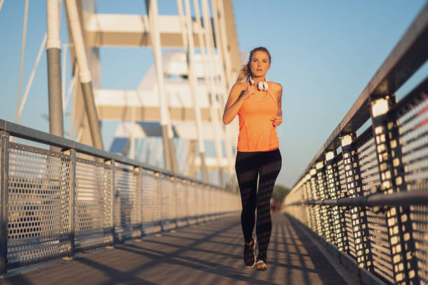 istock Woman jogging outdoor 1263620120