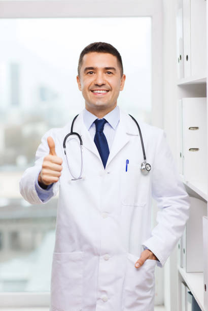istock smiling doctor in white coat at medical office 1263622925