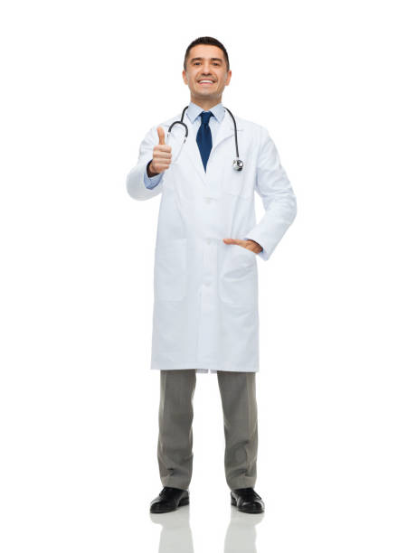 istock smiling doctor in white coat showing thumbs up 1263623476