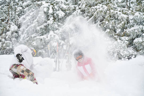 istock Cheerful skiers having fun in snowy mountains. 1263627813