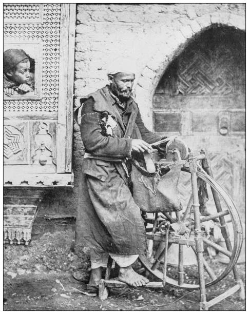 istock Antique black and white photograph: Cairo grinder 1263628154