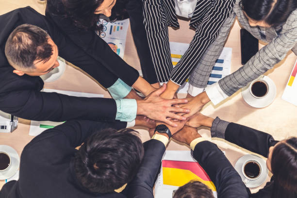 istock Happy business people celebrate teamwork success 1263629630