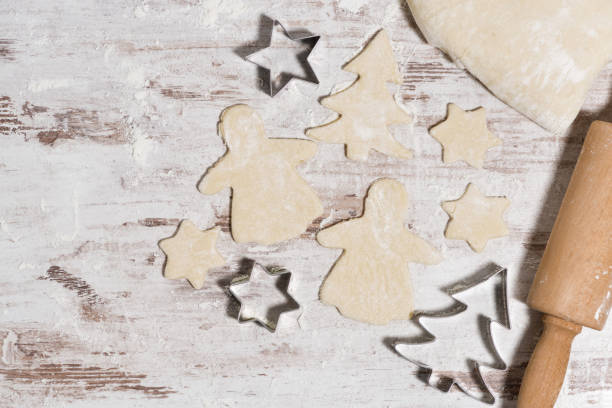 istock dough for baking Christmas cookies on white wooden table 1263631973