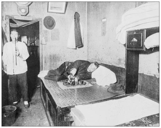 istock Antique black and white photograph: Opium smokers 1263632962