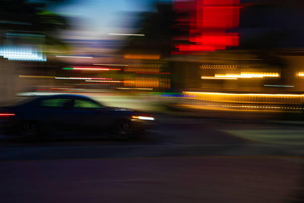 istock Speeding on the road at night 1263636129