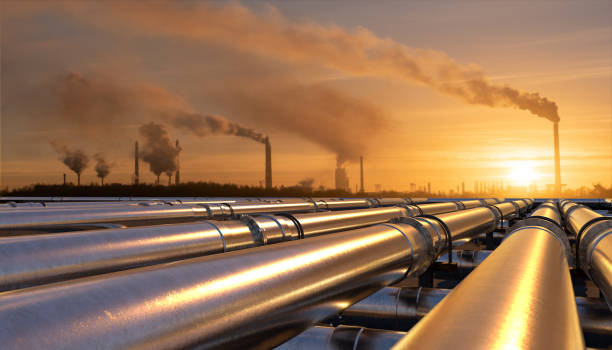 Pipelines leading to an oil refinery Pipelines leading to an oil refinery pipeline stock pictures, royalty-free photos & images