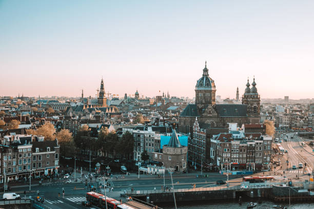 istock Amsterdam cityscape - View over the cathedral and old town 1263640529