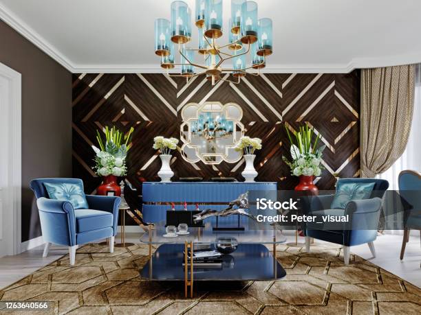 Luxurious Luxury Living Room With Wood Paneling On The Walls With Gold Accents Blue Furniture Brown Walls Stock Photo - Download Image Now
