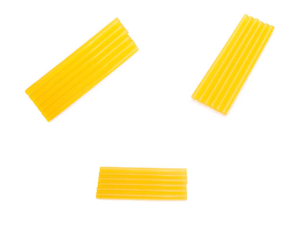 istock Glue sticks for glue gun on white background, isolate, instrument 1263642349